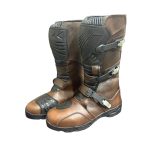 Kvell brown leather adventure motorcycle boots with TPU protection and adjustable buckle closures.